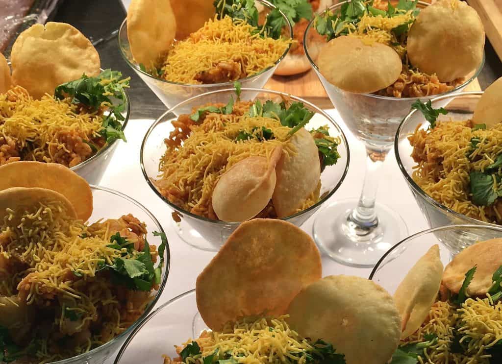 Cocktail glasses containing the Bhel Puri