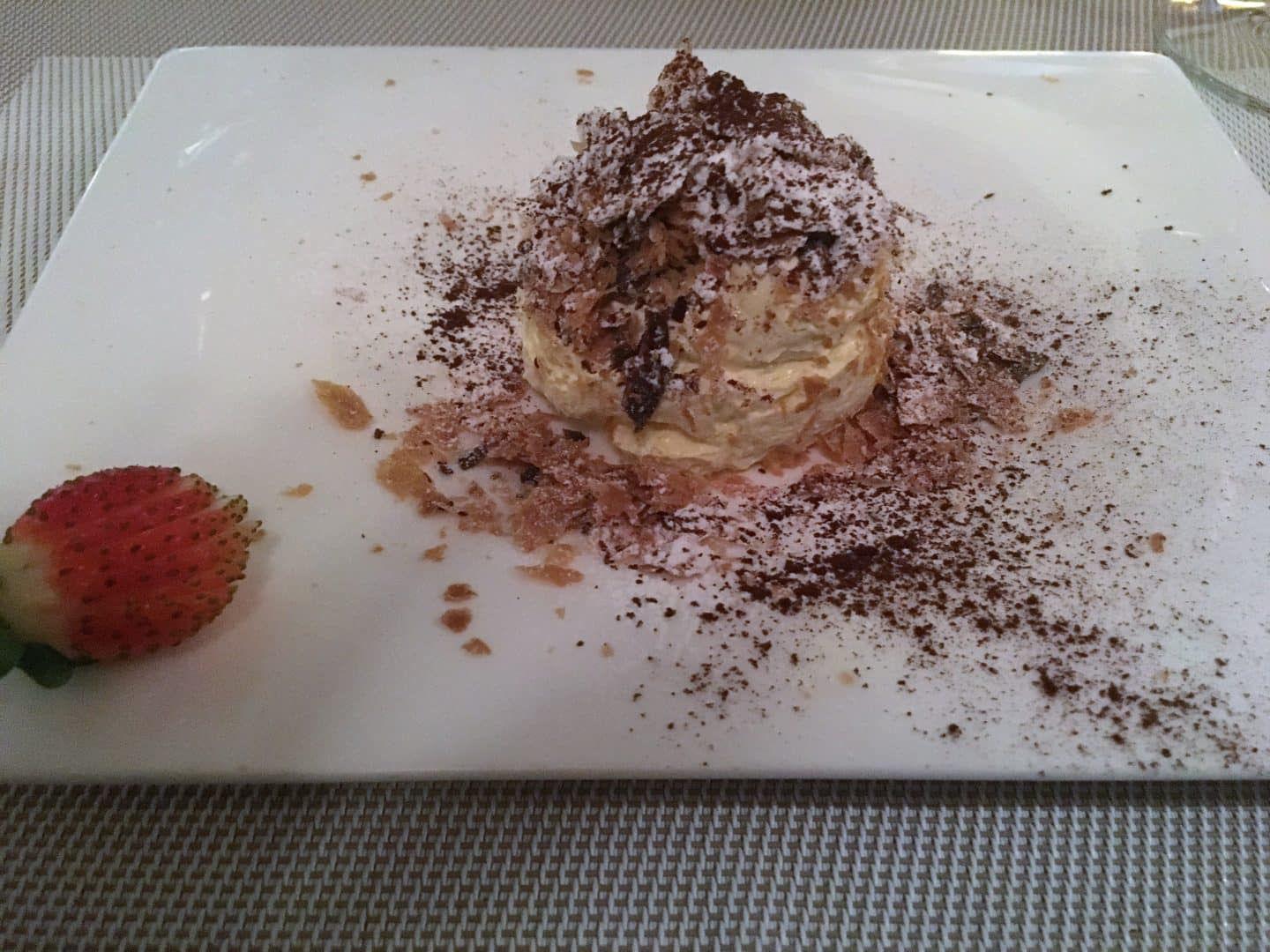 fine dining restaurants in Florence - a square plate with deconstructed Chantilly mille-feuille 