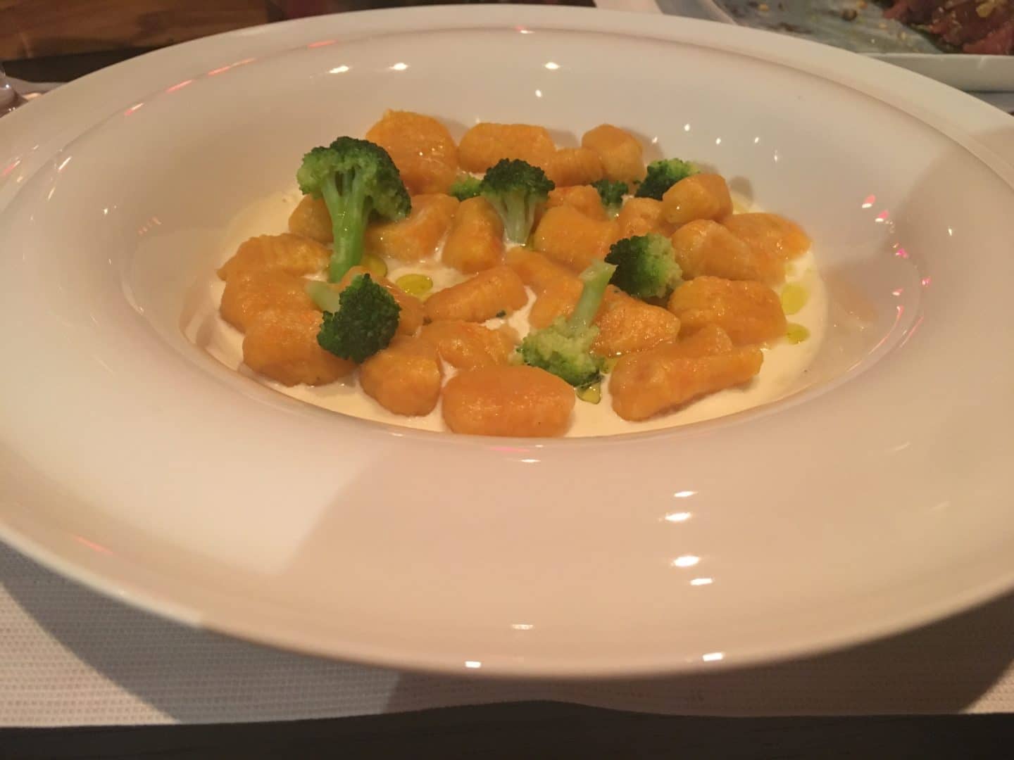 Fine Dining Restaurants in Florence, Gnocchi in autunno Homemade pumpkin gnocchi, with “taleggio” cheese sauce and broccol