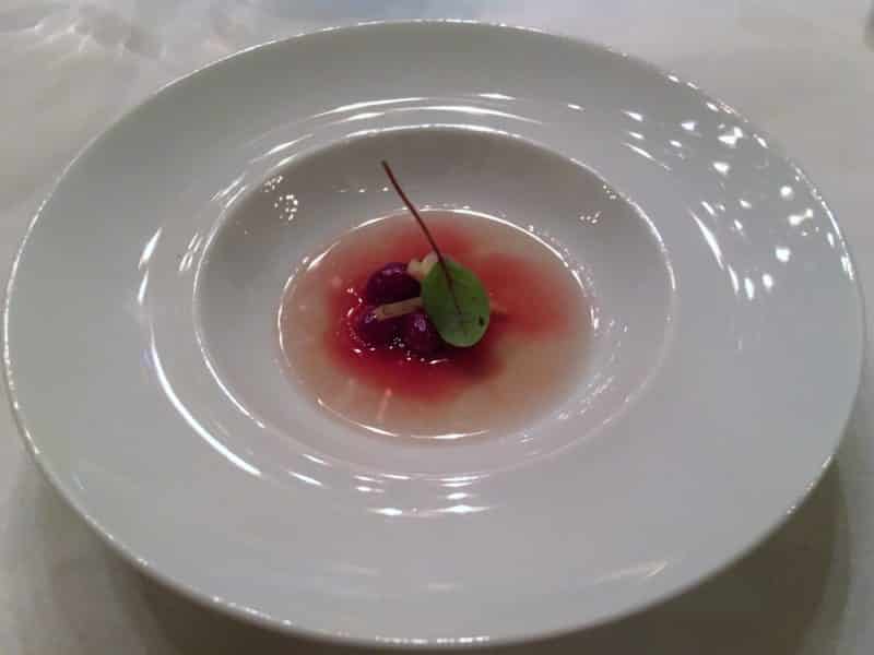 Elegant dining at 2 Michelin Star Spondi in Athens Beetrot Consume appetiser