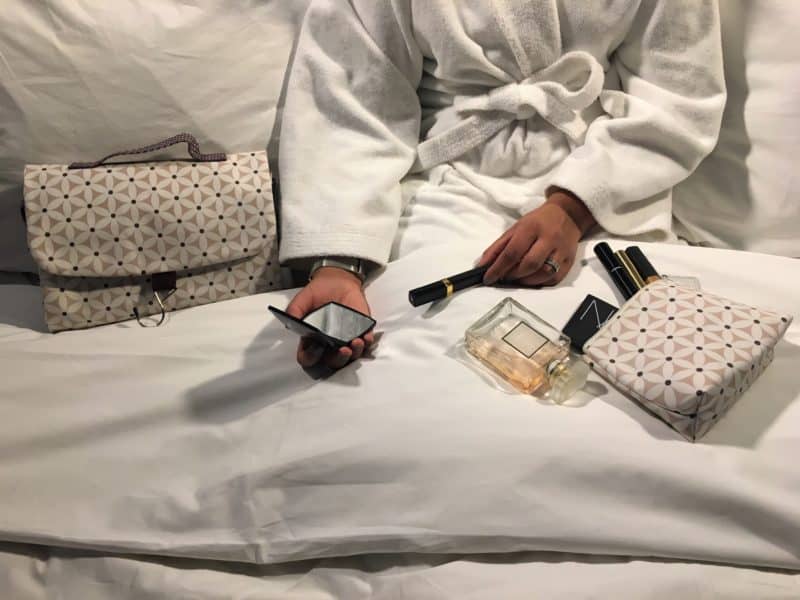 My globetrotting essentials by Victoria Green. Washbags in Bed