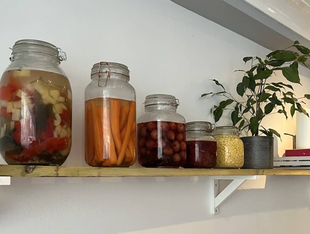 Restaurant 264 interior jars filled with preserved vegetables