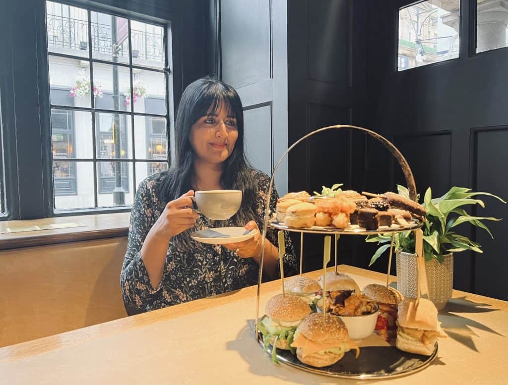 Afternoon Tea at Knight & Garter: bejal with cup of tea and stand