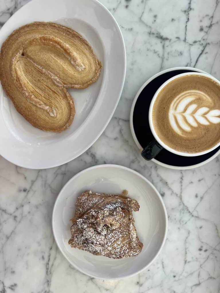 Tatte Bakery palmier, latte and almond croissant.