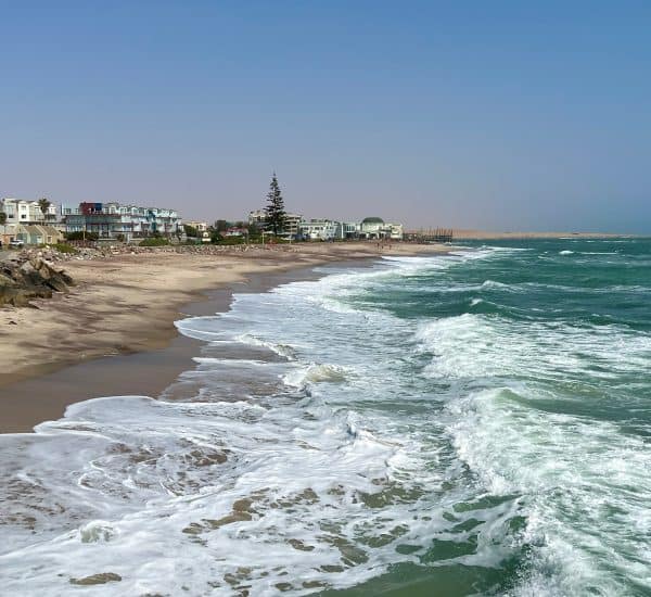 Things to do in Swakopmund: The beach with a view of coastal town