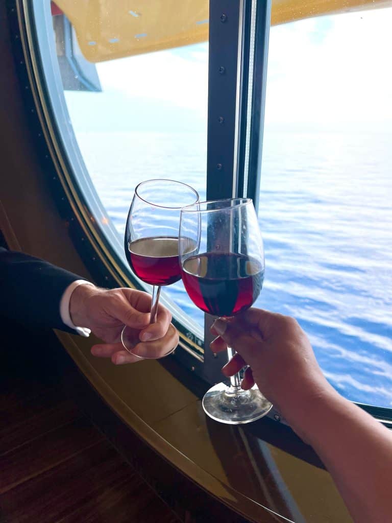 First-time cruise guide: Dining room window with wine glasses