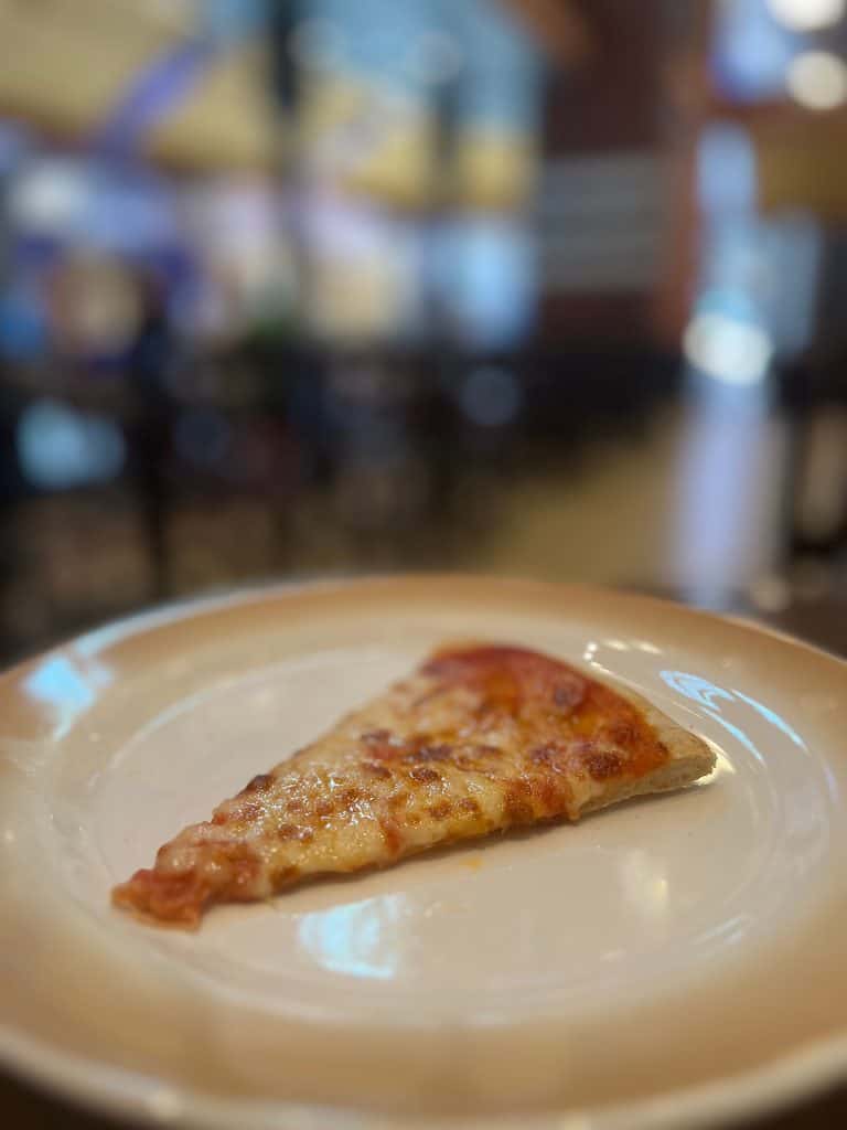 Slice of Margherita Pizza in Sorrento's
