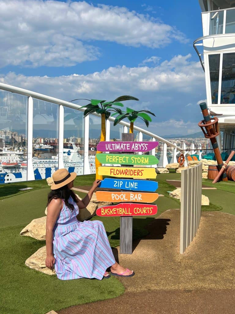 Bejal with activity signs on Symphony of the Seas